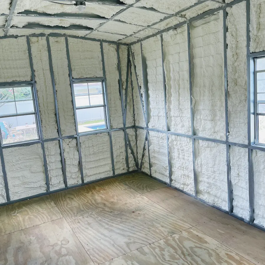 Closed-cell spray foam insulation applied to wall cavities in a residential project in Pepper Pike